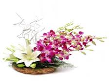 Purple Orchids White Lilies in basket