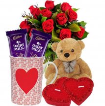2 valentine hearts 1 Teddy 2 Silk chocolates 1 coffee mug 12 Red roses