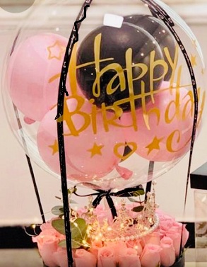 30 pink roses basket tied to hot air balloon printed Happy Birthday with pink balloons inside