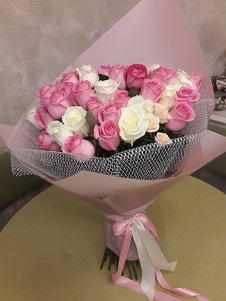 40 Pink and White roses in net packing