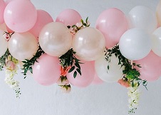 15 Pink and white balloons decorated with flowers and foliage