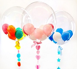 3 Transparent Bubble Balloons with blue and white inside 1st balloon Pink and red in the 2nd balloon and orange yellow inside the 3rd balloon Balloon