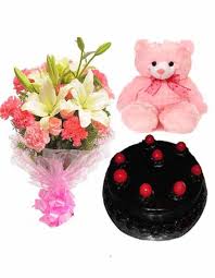 1/2 Kg chocolate Cake with Teddy(6 inches) and White lilies pink carnations bouquet