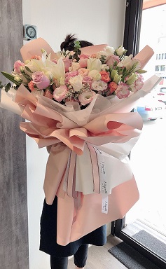 Life Size Pink White and Peach in soft tones Flowers Bouquet wrapped in paper