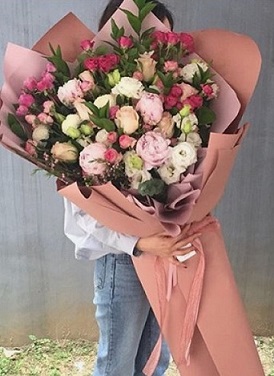 Large bouquet of pastel shades flowers in 3 to 4 feet