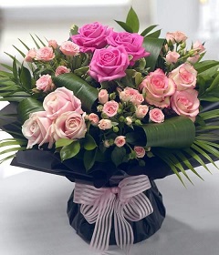 20 Light and dark pink roses in a bouquet