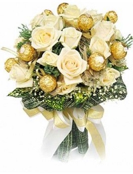 16 Ferrero rocher chocolates and 10 white roses in a bouquet
