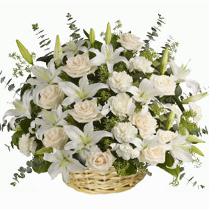 White Lilies with white roses in a basket
