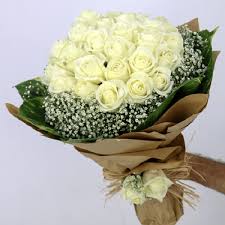 20 White roses in brown paper and white ribbons