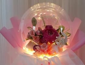Led Light bubble balloon with single red rose and petals inside wrapping in white and red