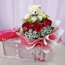 Teddy bear(6 inches) 3 Red roses in a basket