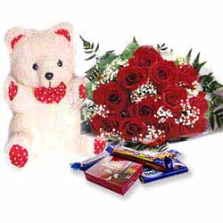 Teddy Soft Toy(6 inches) with a Dozen Roses and a Box of Cadbury Celebration Chocolates