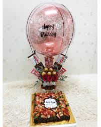 Happy Birthday printed hot air balloon with 5 Ferrero Rocher chocolates 5 dairy milk small chocolates in basket Cake 1 kg Fresh Fruit